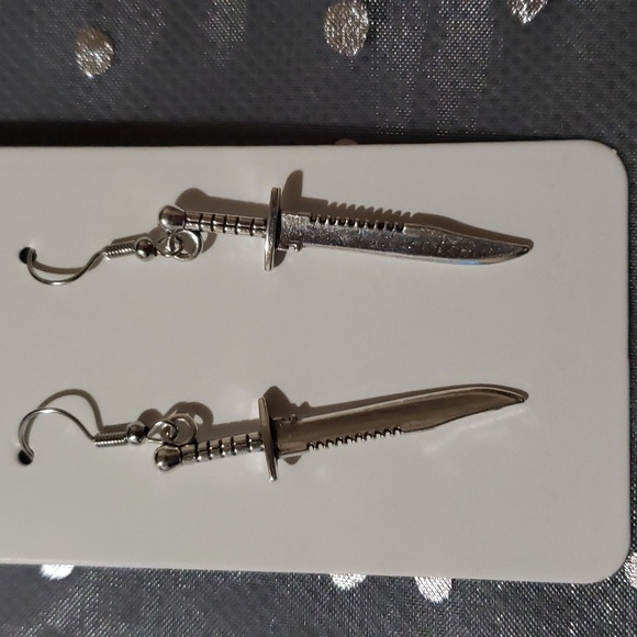 Silver toned dagger earrings - Picture 2 of 4